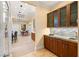 Kitchen and butler's pantry features stone countertops and ample storage space at 1234 Campbell Dr, Las Vegas, NV 89102