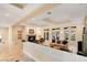Expansive living room with a fireplace, large windows, and stylish decor at 1234 Campbell Dr, Las Vegas, NV 89102