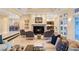 Elegant living room featuring a fireplace, tile flooring, and stylish furnishings at 1234 Campbell Dr, Las Vegas, NV 89102