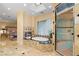 Opulent main bathroom with soaking tub, fireplace, glass shower, and views into the main bedroom at 1234 Campbell Dr, Las Vegas, NV 89102