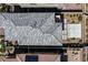 Aerial view of a home's roof and backyard patio with gravel landscaping at 12524 Skylight View St, Las Vegas, NV 89138