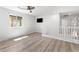 Bedroom featuring hardwood floors and view of the outdoor area at 12524 Skylight View St, Las Vegas, NV 89138