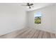 Bedroom featuring hardwood floors and view of the outdoor area at 12524 Skylight View St, Las Vegas, NV 89138