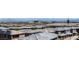 View of new neighborhood featuring tile roofs and beautiful city skyline in the background at 12524 Skylight View St, Las Vegas, NV 89138