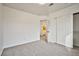Bedroom with closet and view to attached bathroom at 1604 Tamborine Ct, Las Vegas, NV 89128