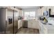 Modern kitchen featuring stainless steel appliances, and white cabinetry at 1900 Cameron St, Las Vegas, NV 89102