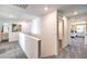 Hallway with neutral tones and carpet floors providing access to bedrooms and bathrooms creating a seamless transition at 216 Biscotti Ave # Lot 126, North Las Vegas, NV 89084