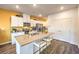 A spacious kitchen displays an island, stainless steel appliances, and ample storage at 216 Biscotti Ave # Lot 126, North Las Vegas, NV 89084