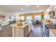 Open-concept kitchen with stainless steel appliances and view of living space, creating an inviting and modern atmosphere at 216 Biscotti Ave # Lot 126, North Las Vegas, NV 89084