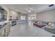 Bright living area with a fireplace, tile floors, recessed lighting, and lots of natural light at 2171 Deadwood St, Pahrump, NV 89048