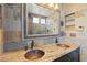 Bathroom with dual sinks, granite counters and a large mirror at 224 Devotion Ct, Henderson, NV 89052