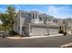 Two-story townhome boasts a two-car garage and desirable corner lot location at 224 Devotion Ct, Henderson, NV 89052