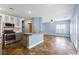Modern kitchen featuring stainless steel appliances, a center island, and ample lighting at 224 Devotion Ct, Henderson, NV 89052