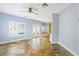 Spacious living room featuring tiled flooring, bright windows, and fresh paint at 224 Devotion Ct, Henderson, NV 89052
