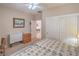 Cozy bedroom featuring twin beds, carpeted floor, closet and a ceiling fan for air circulation at 2539 Stardust Valley Dr, Henderson, NV 89044