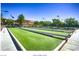 Well-maintained bocce ball courts with a lush green surface at 2539 Stardust Valley Dr, Henderson, NV 89044