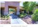 Welcoming entrance to Solera at Anthem featuring desert landscaping and inviting walkway at 2539 Stardust Valley Dr, Henderson, NV 89044