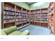 Community library with walls of bookshelves full of books and comfortable seating at 2539 Stardust Valley Dr, Henderson, NV 89044