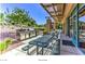 Inviting picnic area with built-in stainless grill and comfortable seating at 2539 Stardust Valley Dr, Henderson, NV 89044