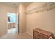 Functional walk-in closet provides ample storage space and easy access to the attached bathroom at 2539 Stardust Valley Dr, Henderson, NV 89044