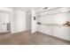 Finished basement featuring built-in cabinets, neutral carpeting, and access to other areas at 2838 Geary Pl # 4002, Las Vegas, NV 89109