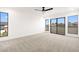 Bright primary bedroom with modern carpet, great light, and sliding glass door at 2838 Geary Pl # 4002, Las Vegas, NV 89109