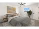 Cozy bedroom featuring neutral decor, a comfortable bed, and a large window with natural light at 2838 Geary Pl # 4002, Las Vegas, NV 89109
