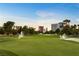 Picturesque golf course view with lush green grass, trees, and sprinklers at 2838 Geary Pl # 4002, Las Vegas, NV 89109