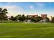 Picturesque golf course view with lush green grass, trees, and sprinklers at 2838 Geary Pl # 4002, Las Vegas, NV 89109