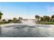 Scenic view of a pond with a fountain and a beautiful building in the background at 2838 Geary Pl # 4002, Las Vegas, NV 89109