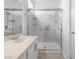 Clean bathroom featuring a glass enclosed shower, sink with modern fixture at 2999 Gettysburg Ave, Henderson, NV 89052