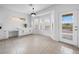 Bright dining area features built-in cabinetry, tiled floor, and a large window with views at 2999 Gettysburg Ave, Henderson, NV 89052