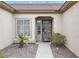 Inviting front entrance with decorative security door, desert landscaping, and a paved walkway at 2999 Gettysburg Ave, Henderson, NV 89052