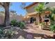 Spacious backyard features mature landscaping, a grill, and a patio for outdoor enjoyment at 3380 Pavlo St, Las Vegas, NV 89121
