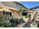 Private backyard with mature landscaping, grill, patio and convenient access from the home at 3380 Pavlo St, Las Vegas, NV 89121