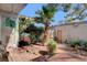 Private backyard with BBQ, mature landscaping, and a paver patio for outdoor living at 3380 Pavlo St, Las Vegas, NV 89121