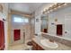 Bathroom with a glass shower door, granite countertop, and towel rack at 3380 Pavlo St, Las Vegas, NV 89121