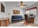 Bedroom featuring a ceiling fan, a window and a desk at 3380 Pavlo St, Las Vegas, NV 89121