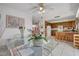 Bright dining area with tile floors and a glass table at 3380 Pavlo St, Las Vegas, NV 89121
