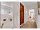 Upstairs hallway with wood cabinet and access to the bedroom at 3380 Pavlo St, Las Vegas, NV 89121