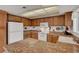 The kitchen features granite counters and a breakfast bar area at 3380 Pavlo St, Las Vegas, NV 89121