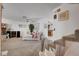 Spacious living room with plush carpet, a ceiling fan, and bright, neutral decor at 3380 Pavlo St, Las Vegas, NV 89121