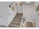 Carpeted staircase leads to the upper level with white walls and doors at 3380 Pavlo St, Las Vegas, NV 89121