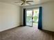 Neutral bedroom featuring sliding glass doors opening onto a balcony at 3550 Bay Sands Dr # 1005, Laughlin, NV 89029