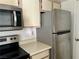 Kitchen with stainless steel microwave and refrigerator at 3550 Bay Sands Dr # 1005, Laughlin, NV 89029
