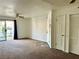 Large living room with fan and sliding glass door to patio at 3550 Bay Sands Dr # 1005, Laughlin, NV 89029