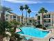 Community swimming pool surrounded by palm trees at 3550 Bay Sands Dr # 1005, Laughlin, NV 89029