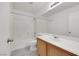 Bathroom featuring shower over tub, updated vanity and neutral color palette at 3644 Shanagolden St, Las Vegas, NV 89129