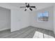 Bedroom featuring modern ceiling fan, neutral paint and light gray wood-look floors at 3644 Shanagolden St, Las Vegas, NV 89129