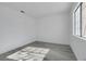 Bright bedroom featuring light gray wood-look flooring and neutral paint at 3644 Shanagolden St, Las Vegas, NV 89129